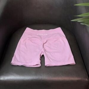 Alphalete Light Pink High-Rise Bike Shorts